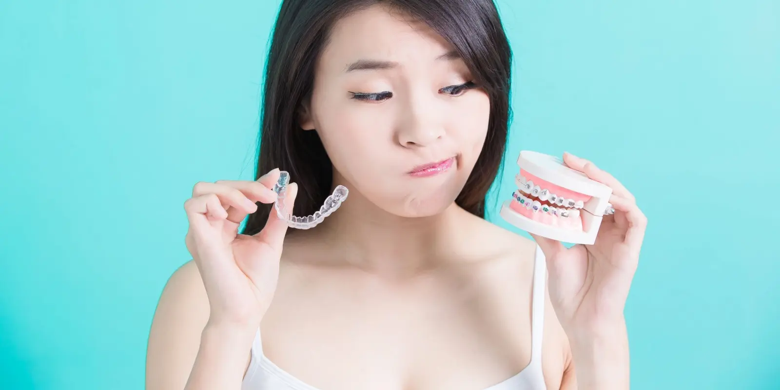 Invisalign vs. Metal Braces hero - Philly Dentistry